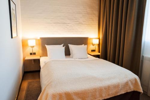 Cama o camas de una habitación en Hotel Scheelsminde