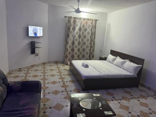 Ένα ή περισσότερα κρεβάτια σε δωμάτιο στο Golden Lily Hotels