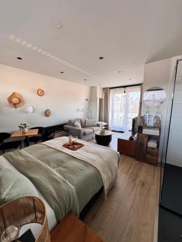 Una cama o camas en una habitación de Studio Casa Martine