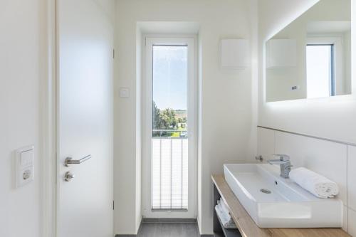 Ένα μπάνιο στο Apartmenthaus vor den Halligen Deichidyll de Luxe