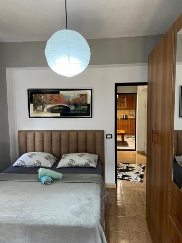 Ένα ή περισσότερα κρεβάτια σε δωμάτιο στο Temali Apartment 3