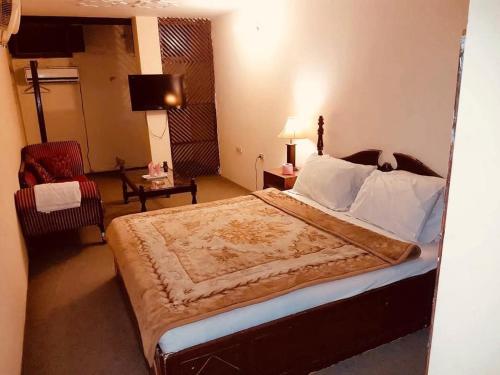 Ένα ή περισσότερα κρεβάτια σε δωμάτιο στο Deego hotel