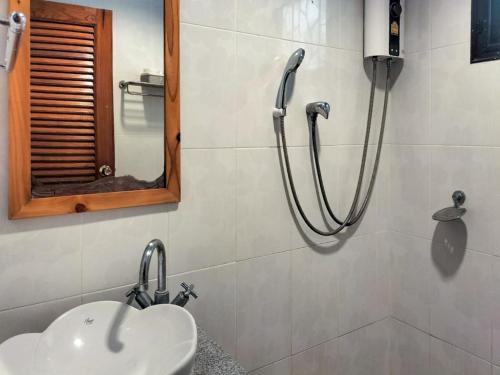 a bathroom with a shower and a sink at Bhumisiri Hill Khaoyai in Ban Tha Chang