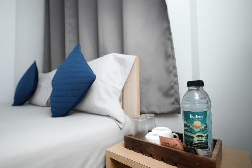 Urban Suites Silpukhuriにあるベッド