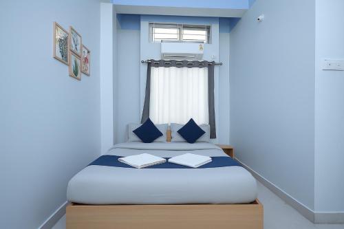 Urban Suites Silpukhuriにあるベッド