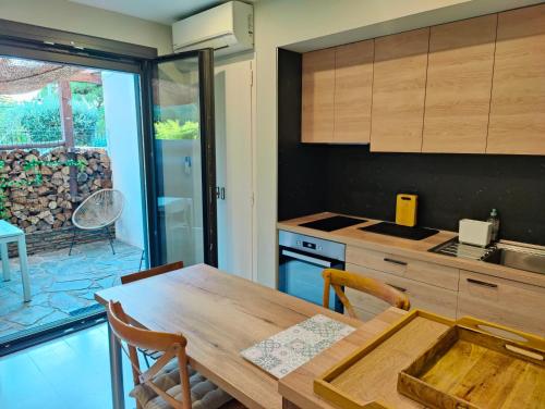 Coquet appartement avec patio privatif-Stationnement gratuit à proximité