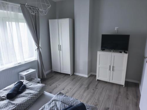 TV a/nebo společenská místnost v ubytování ML 81 apartman