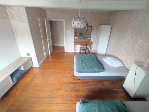 Katil atau katil-katil dalam bilik di Wood Is Good! Kelkheim Central 24 7 Check In