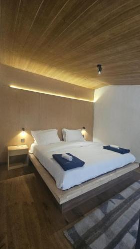 Ein Bett oder Betten in einem Zimmer der Unterkunft The Himalayan Tyangboche