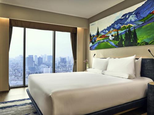 Кровать или кровати в номере Novotel Hanoi Thai Ha