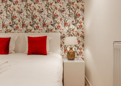 Un ou plusieurs lits dans un hébergement de l'établissement Acropolis - Luxury Appartments I Hotelservice and parking