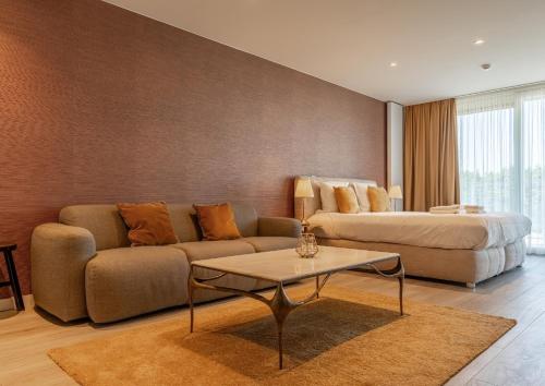 Coin salon dans l'établissement Acropolis - Luxury Appartments I Hotelservice and parking