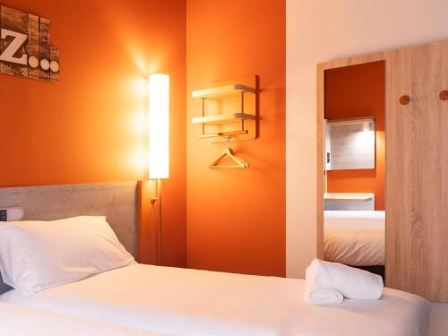 Giường trong phòng chung tại Ibis Budget Bilbao City