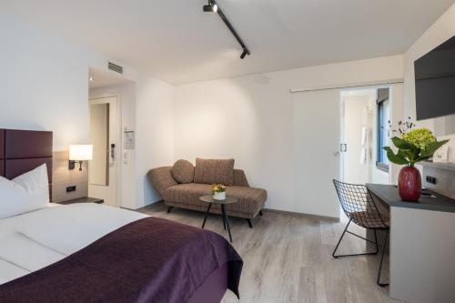 Postel nebo postele na pokoji v ubytování Hotel Gloria Superior