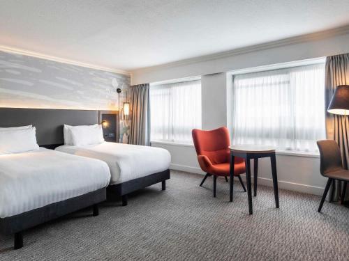 Ένα ή περισσότερα κρεβάτια σε δωμάτιο στο Mercure Bedford Centre Hotel