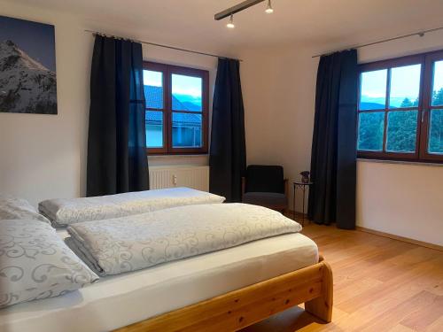 Postel nebo postele na pokoji v ubytování Alpenwald