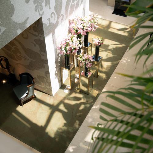 an overhead view of flowers in vases on a wall at Park Hyatt Istanbul - Macka Palas in Istanbul