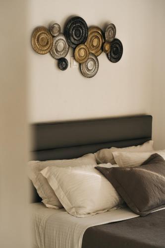 a bedroom with a bed with wheels on the wall at Kea Villa Thea by A&D Properties in Otzias