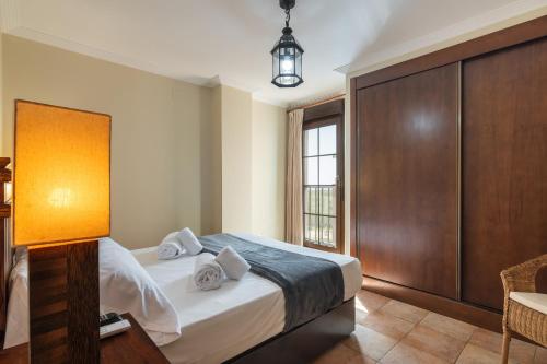 Postel nebo postele na pokoji v ubytování Las Palmeras by Ĥ - Playa Punta del Moral PLHP51P65