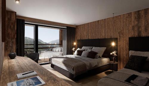 a bedroom with a bed and a large window at Villa Erina in Ortisei