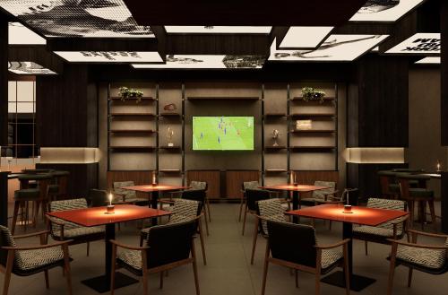 TV a/nebo společenská místnost v ubytování Trendy Perge Resort & Suites