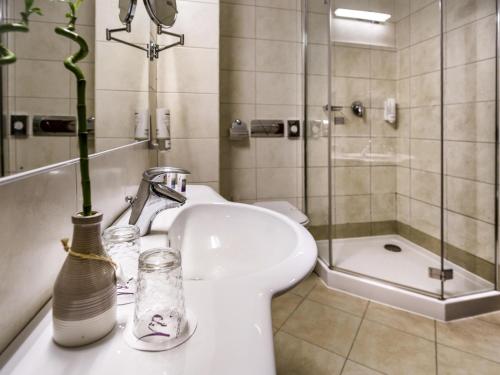 Ванная комната в Mercure Sibiu Airport