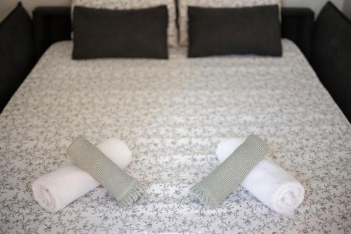 En eller flere senge i et værelse på Le Val dOr - Calme - Grand Jardin - Parking privé