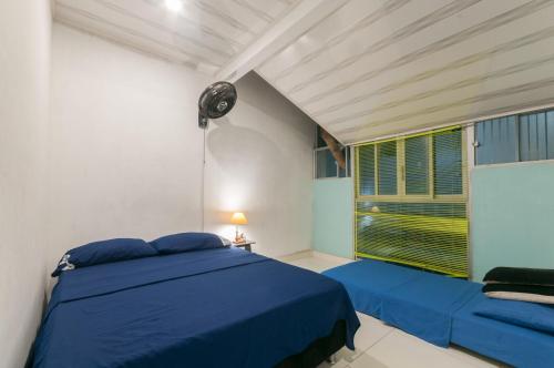 Ένα ή περισσότερα κρεβάτια σε δωμάτιο στο APARTAMENTO 10 PERSONAs