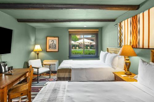 Кровать или кровати в номере Hotel Glorieta