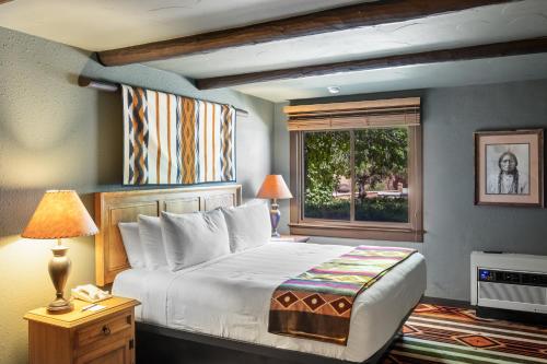 Кровать или кровати в номере Hotel Glorieta