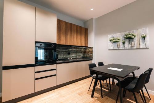 Kuchyň nebo kuchyňský kout v ubytování Day LUX Aparthotel