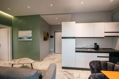 Kuchyň nebo kuchyňský kout v ubytování Day LUX Aparthotel