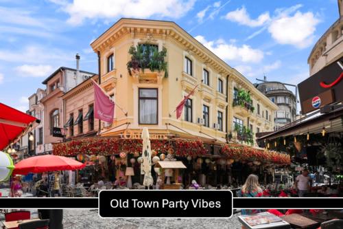 an old town party vibes sign in front of a building at Boheme Social Apartment in Bucharest