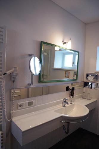 Koupelna v ubytování Hotel Der Greif