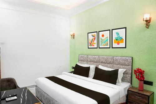 Ένα ή περισσότερα κρεβάτια σε δωμάτιο στο Collection O Shandilya Grand Residency