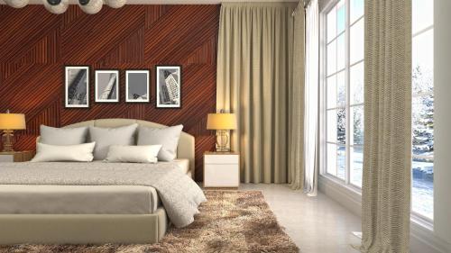 a bedroom with a large bed and a large window at Hotel Olive Aero Suites Near Delhi IGI Airport in New Delhi