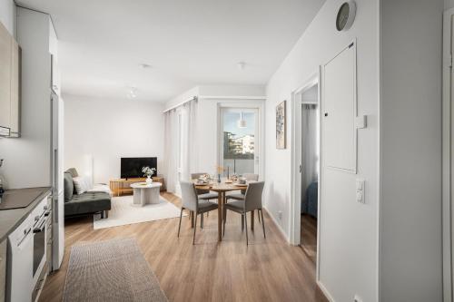 Μια τηλεόραση ή/και κέντρο ψυχαγωγίας στο Lumo Penthouse Hosted by Hygge Host