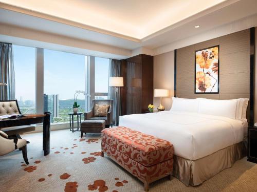 Ένα ή περισσότερα κρεβάτια σε δωμάτιο στο Fairmont Chengdu