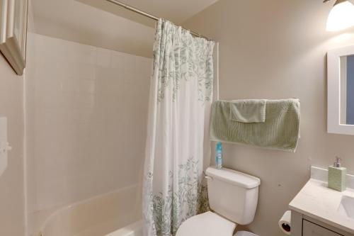 a white bathroom with a toilet and a shower at Stress-Free Commuting! Extended Stay in Littleton in Littleton