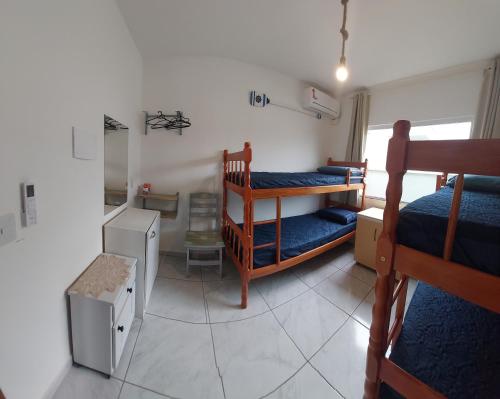 Cama o camas de una habitación en Relaxing House on Barra Velha Beach