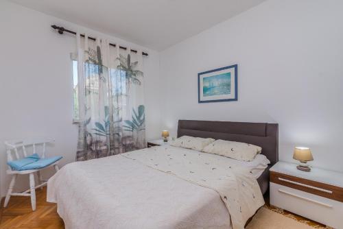 Postel nebo postele na pokoji v ubytování Apartment Sara on the island of Krk