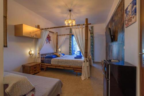 Photo de la galerie de l'établissement Katigiorgis Blue Hotel & Bungalow SPA Resort, à Agios Georgios