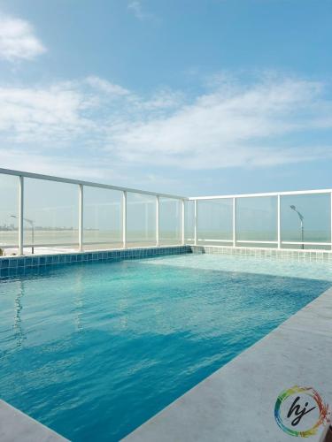 a swimming pool on top of a building at Paradise Flat 114 in Nossa Senhora do Livramento
