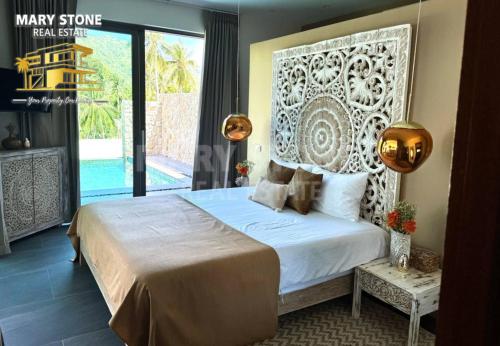 Ένα ή περισσότερα κρεβάτια σε δωμάτιο στο Villa Clarine - Relaxing 3BR Unique Villa