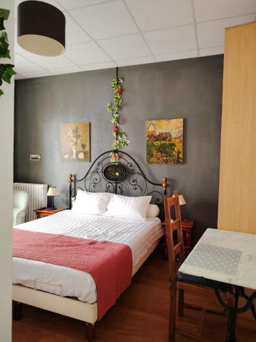 Krevet ili kreveti u jedinici u okviru objekta Appart'Hôtel Le Combes