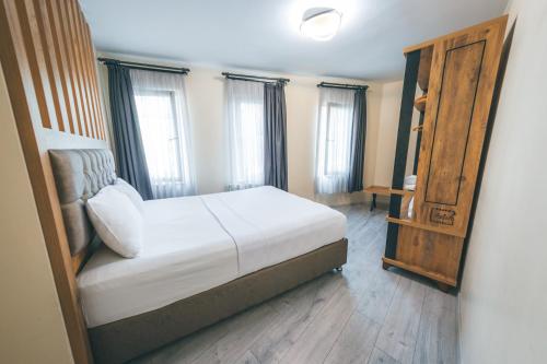 Postel nebo postele na pokoji v ubytování Grand 464 Otel