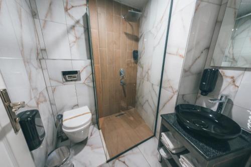 Koupelna v ubytování Grand 464 Otel