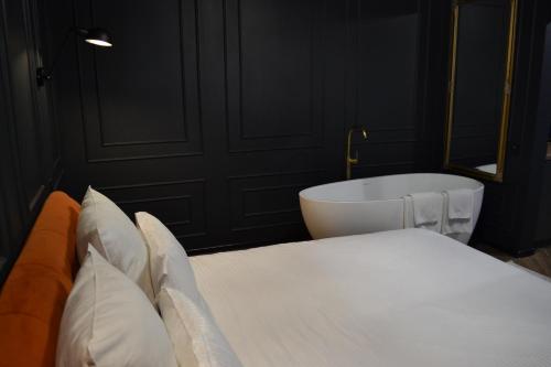 Ένα ή περισσότερα κρεβάτια σε δωμάτιο στο Central Gate apartment