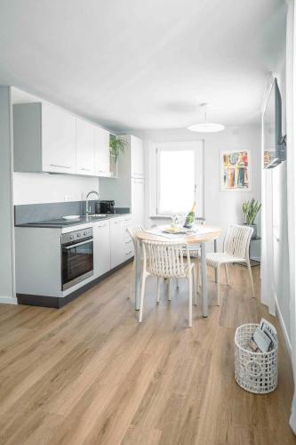 Kuchyň nebo kuchyňský kout v ubytování La Croce Apartments