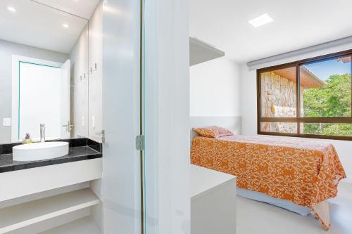 Ένα ή περισσότερα κρεβάτια σε δωμάτιο στο GB126 Maravilhoso Village com 4 suítes - Guarajuba